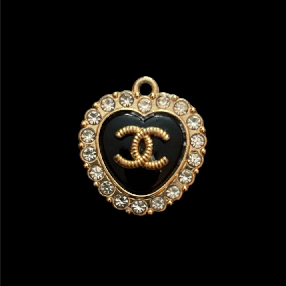 CHANEL Black and Gold Heart Pendant